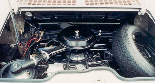 110-hp engine with oil bath pre-cleaner (lower left)