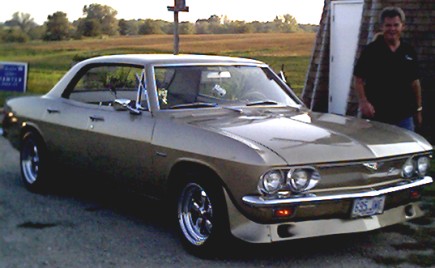 John Miller beside his 1966 Corvair 500 sport sedan